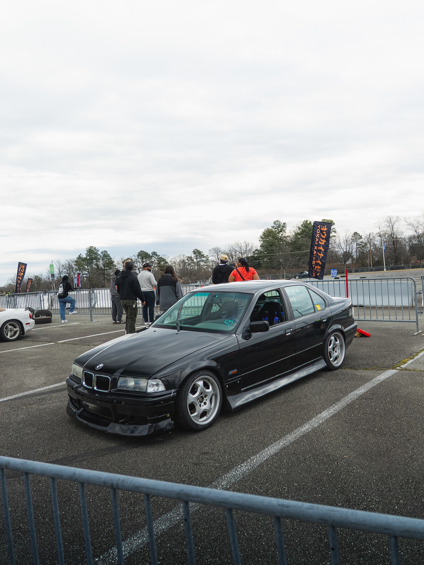 The Unbound Garage BMW E36 drift car at a grassroots event